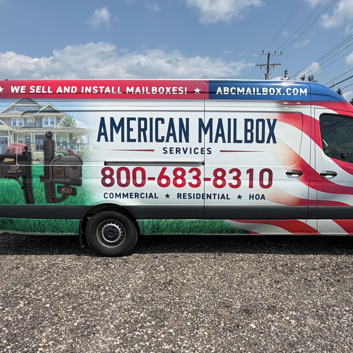 American Mailbox Services branded installation van parked near a job site.